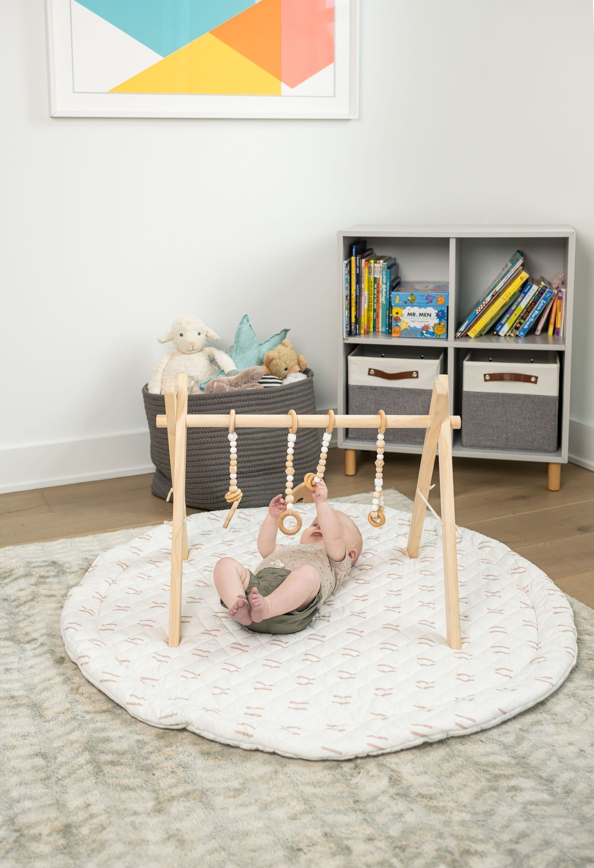 Poppyseed Play Baby Gym, wood baby gym provides many benefits