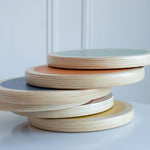 Side view of wood stepping stones showing their stackable design