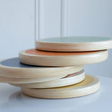Side view of wood stepping stones showing their stackable design