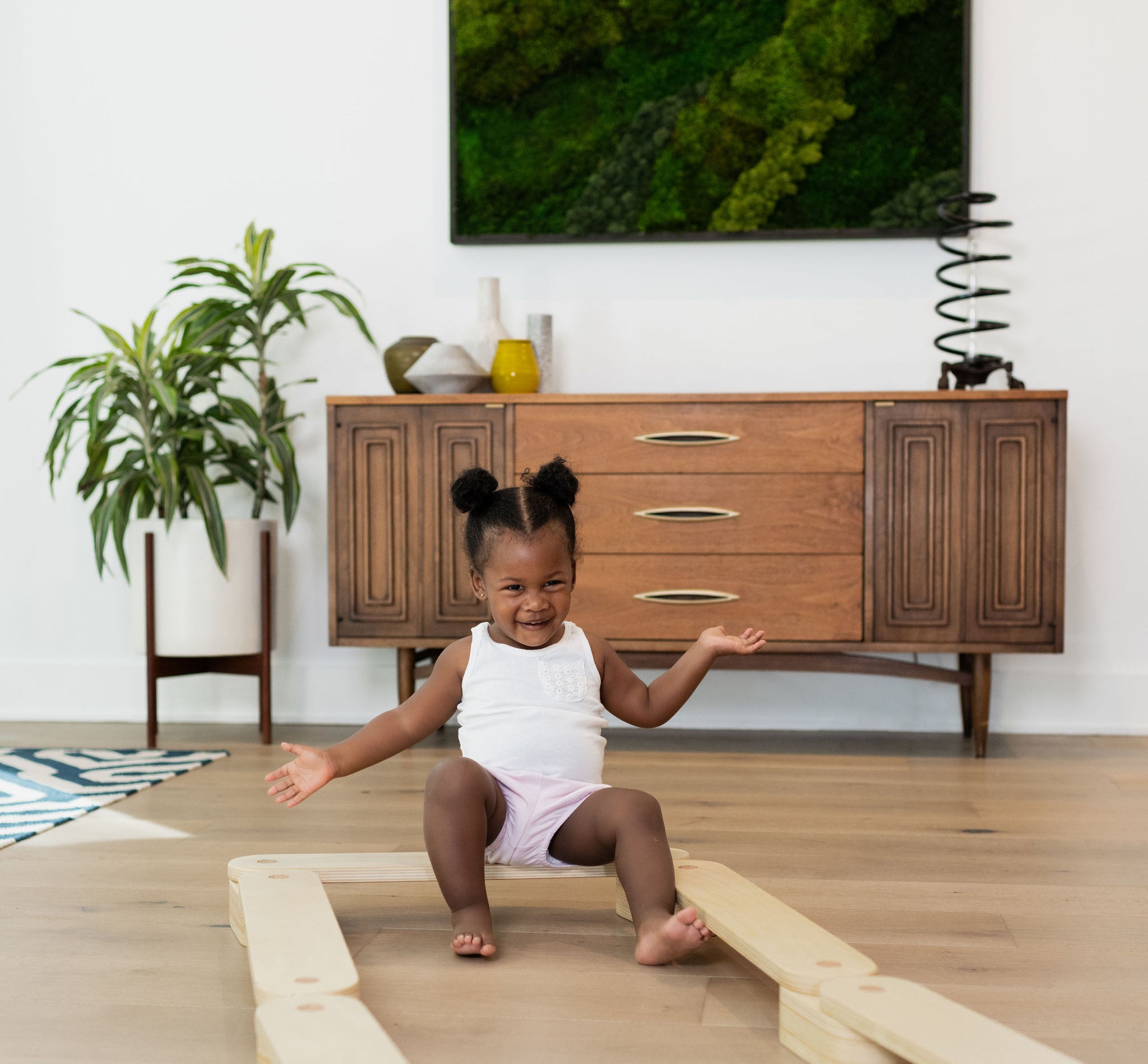 Wooden balance beam enhances children's coordination.