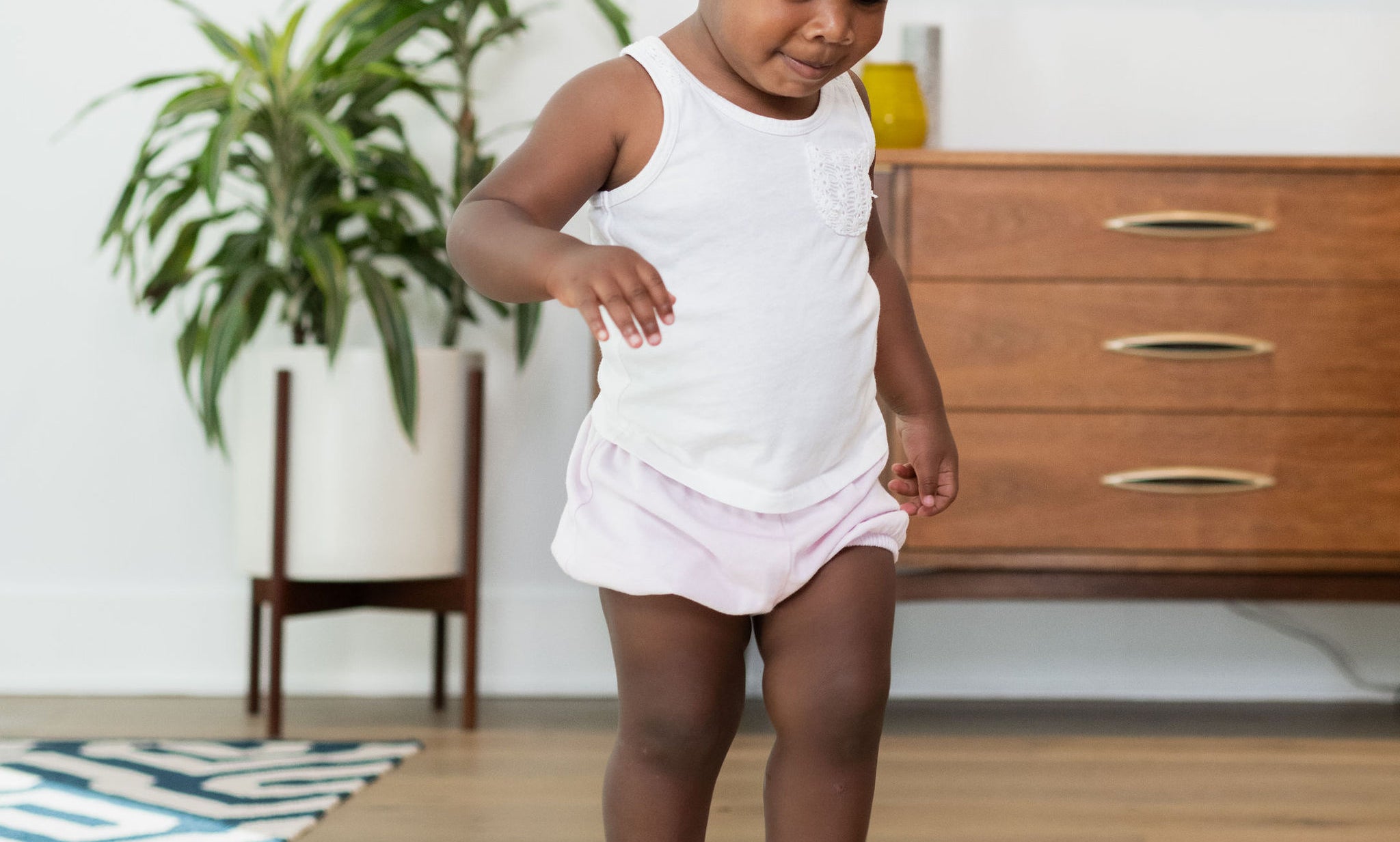 Sturdy wooden balance beam for toddlers.