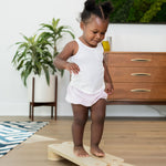 Sturdy wooden balance beam for toddlers.