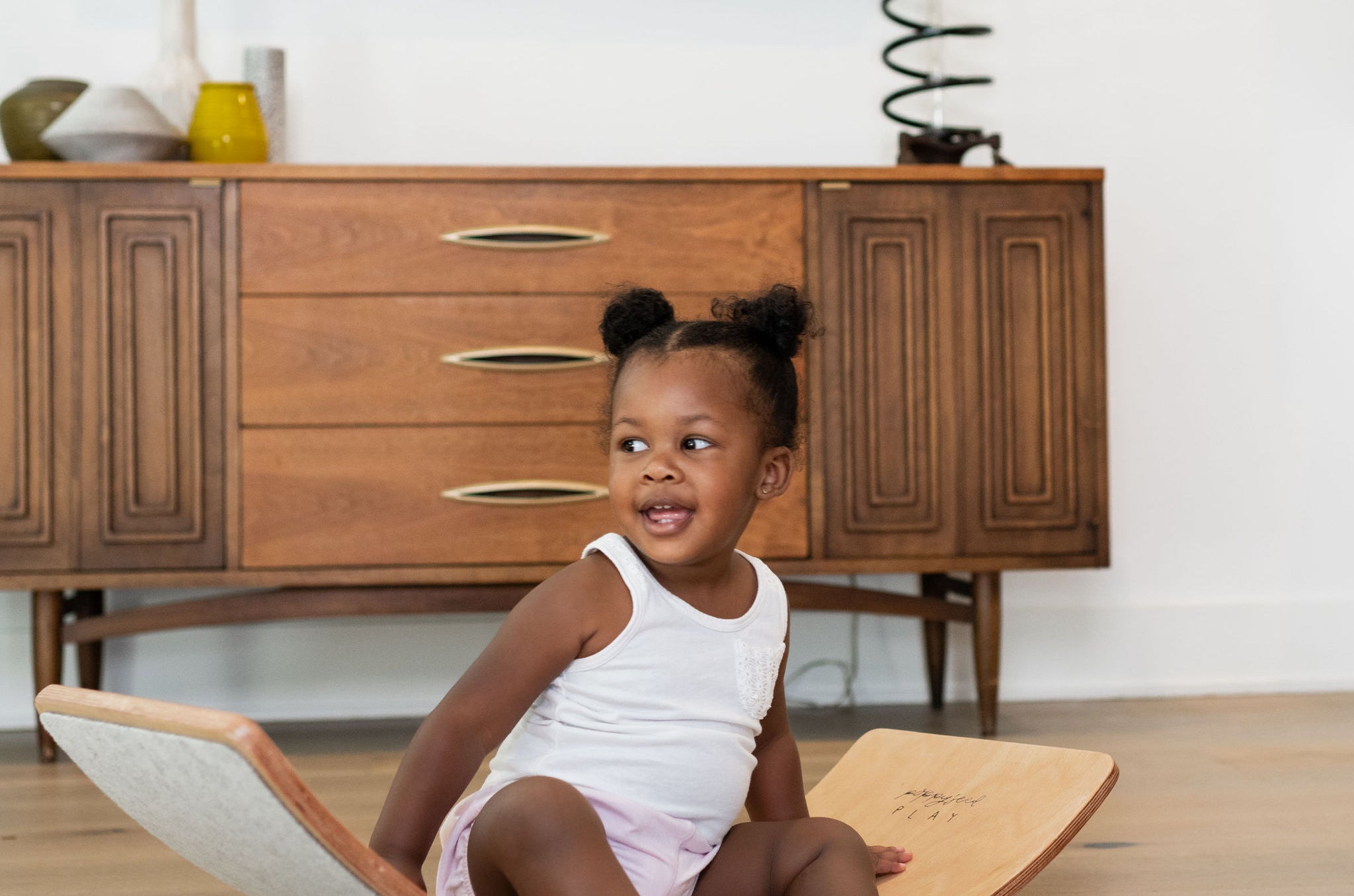 Wooden balance board for fun, exercise.