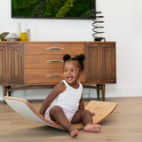 Wooden balance board for fun, exercise.