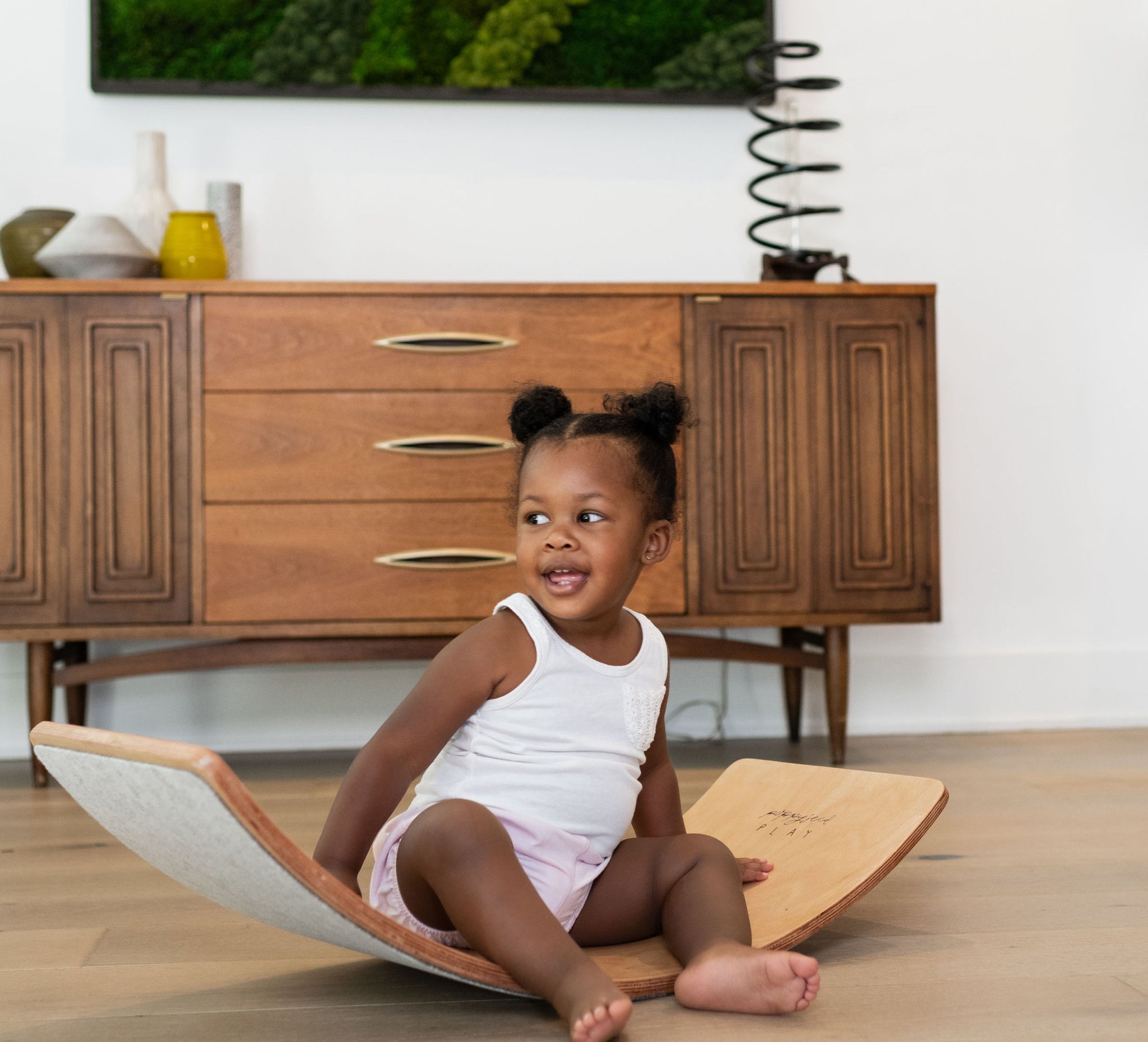 Wooden balance board for fun, exercise.