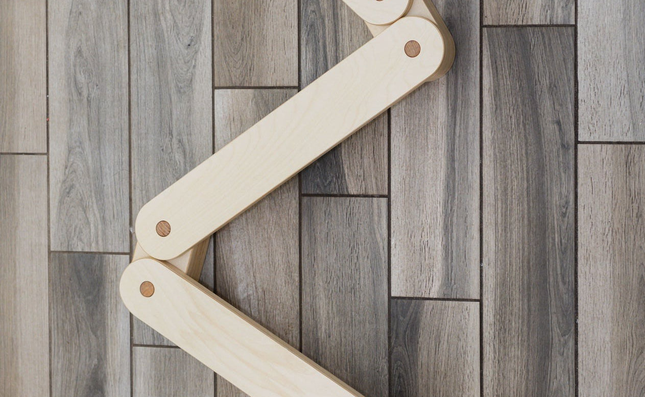 Elegant wooden balance beam for kids' exercise.