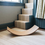 Stylish wooden balance board for kids' coordination.