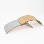 Safe wooden balance board for developmental play.