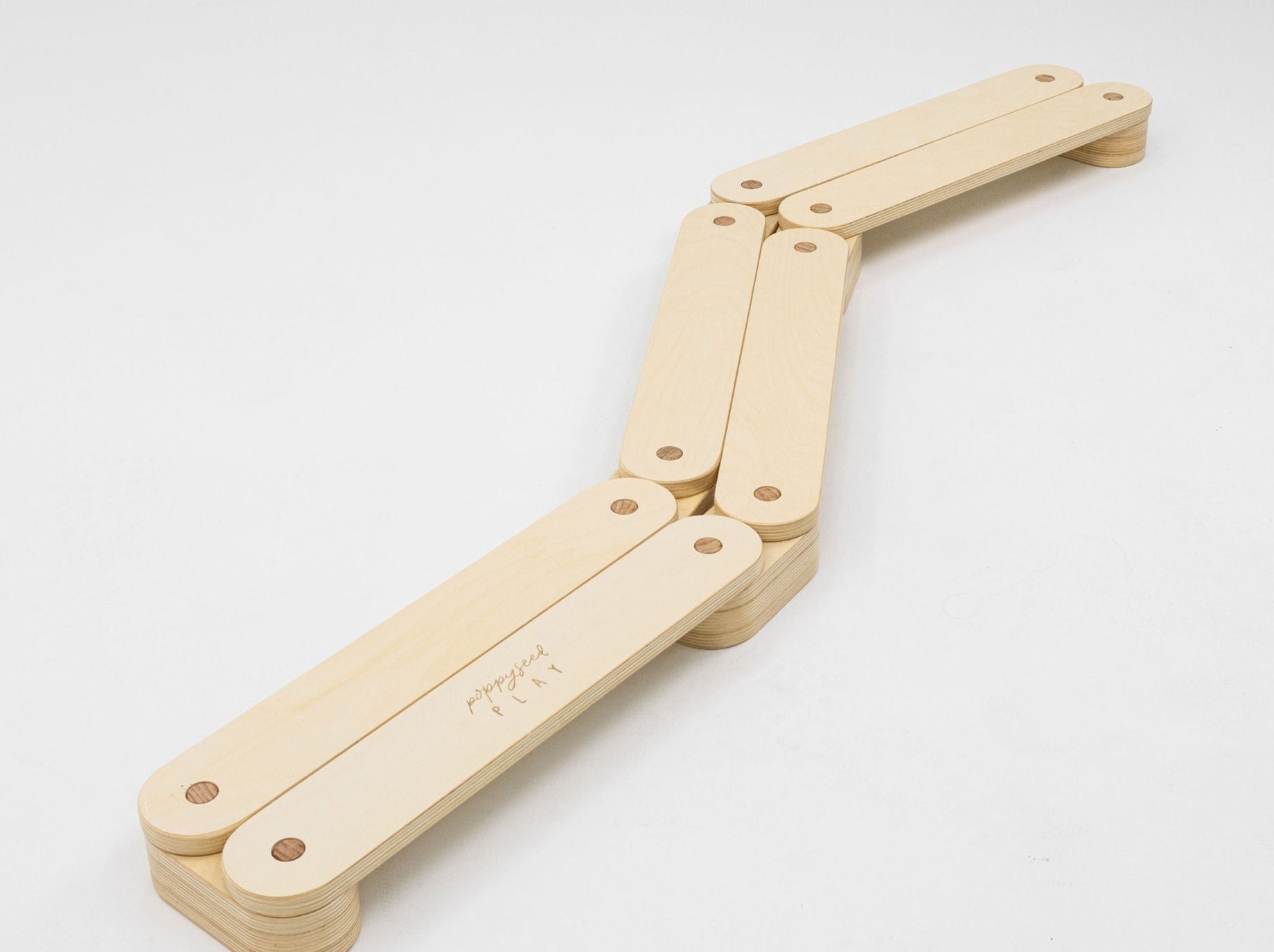 Wooden balance beam promotes balance and agility.