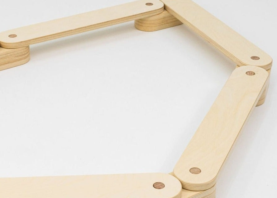 Classic wooden balance beam for developmental play.