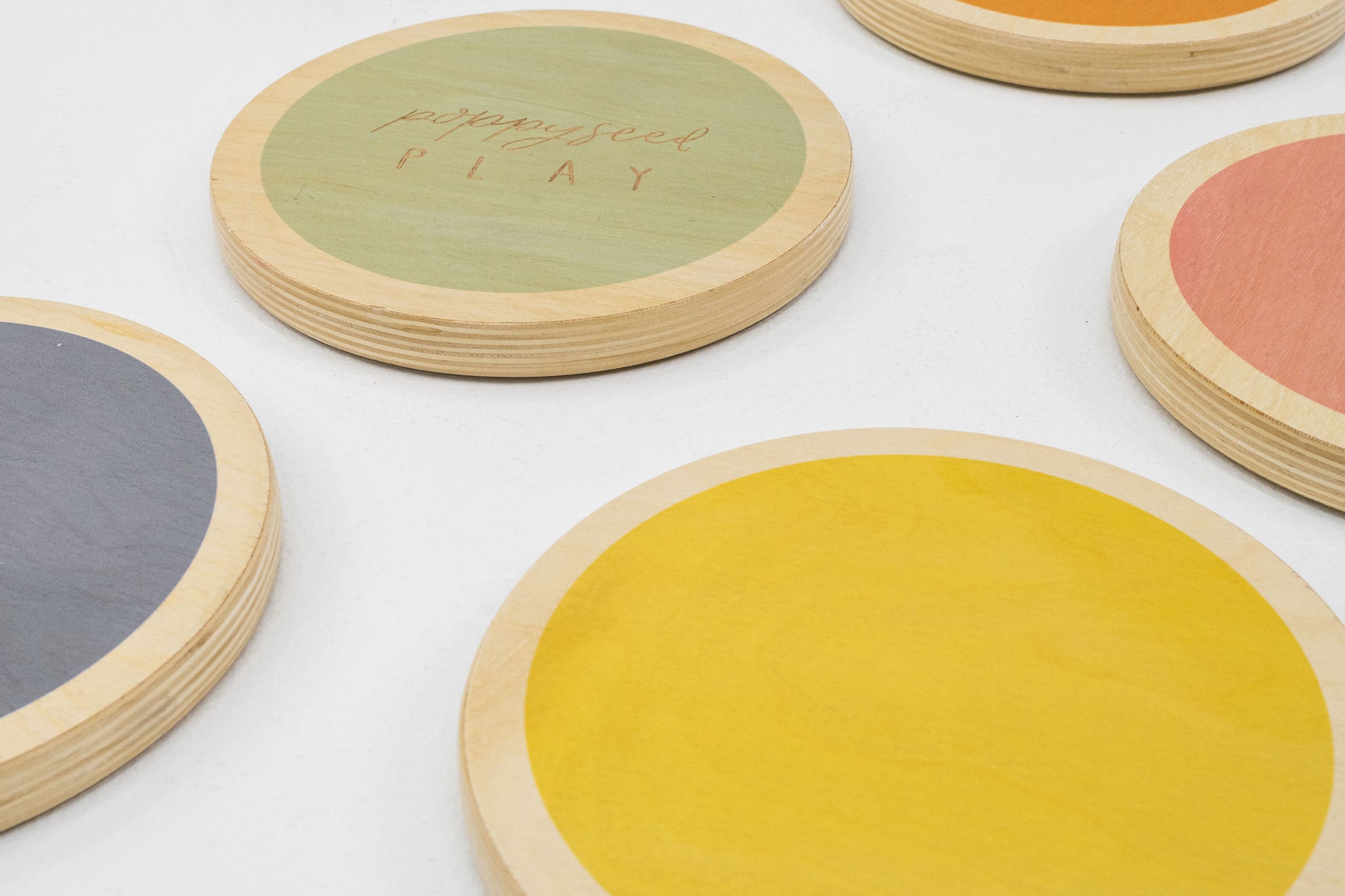 Wood stepping stones displayed in a natural outdoor setting.
