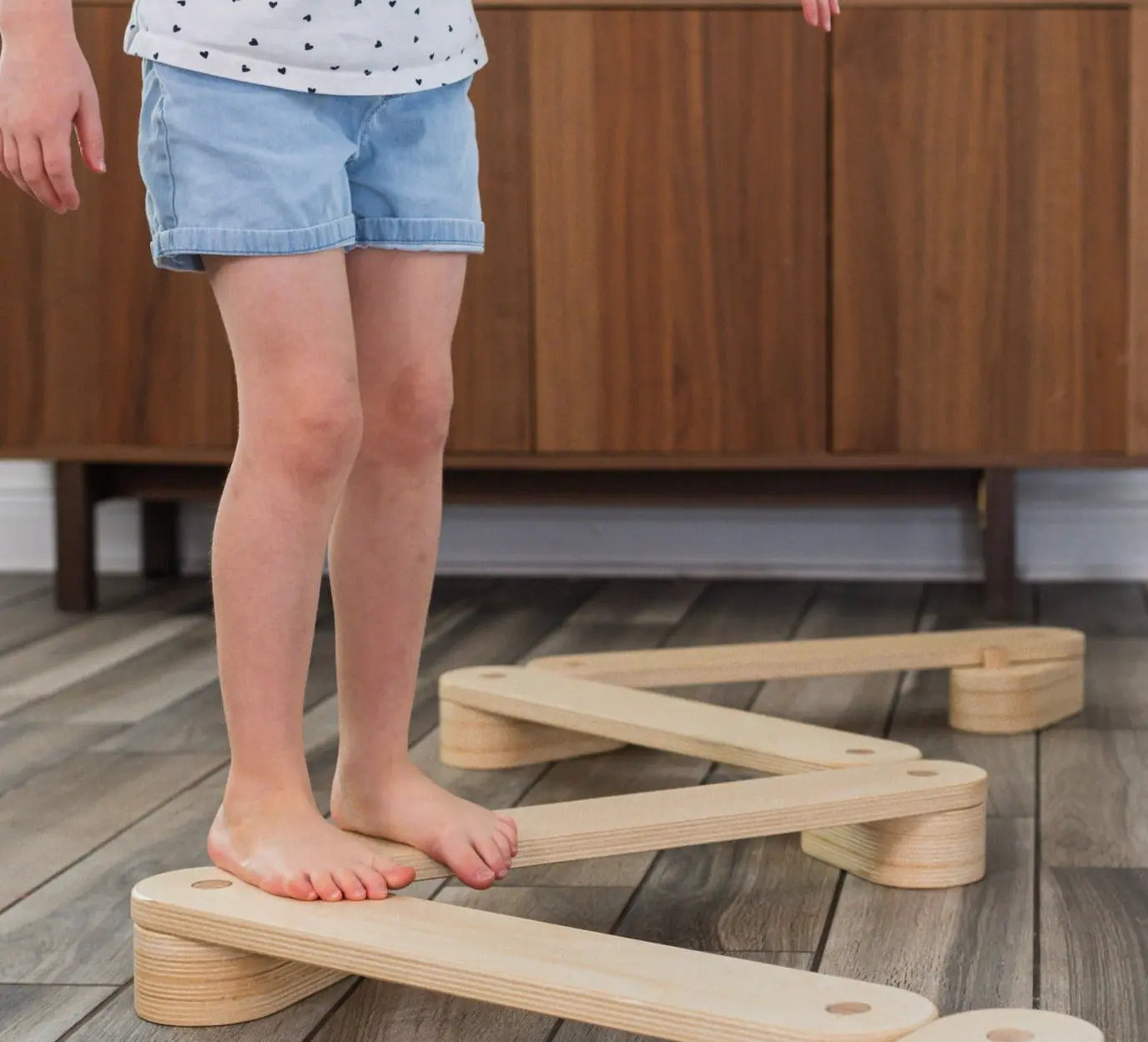 Child Walking on Balance Beam