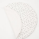 Reversible padded baby play mat with two different designs for versatile play options.