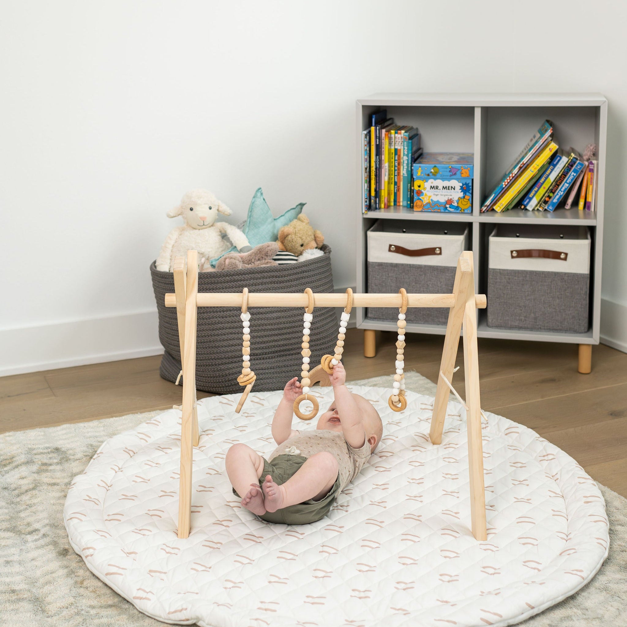 Poppyseed Play Baby Gym, wood baby gym provides many benefits