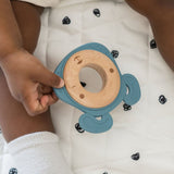 Side-by-side comparison of silicone and wood teethers, highlighting their combined durability and softness