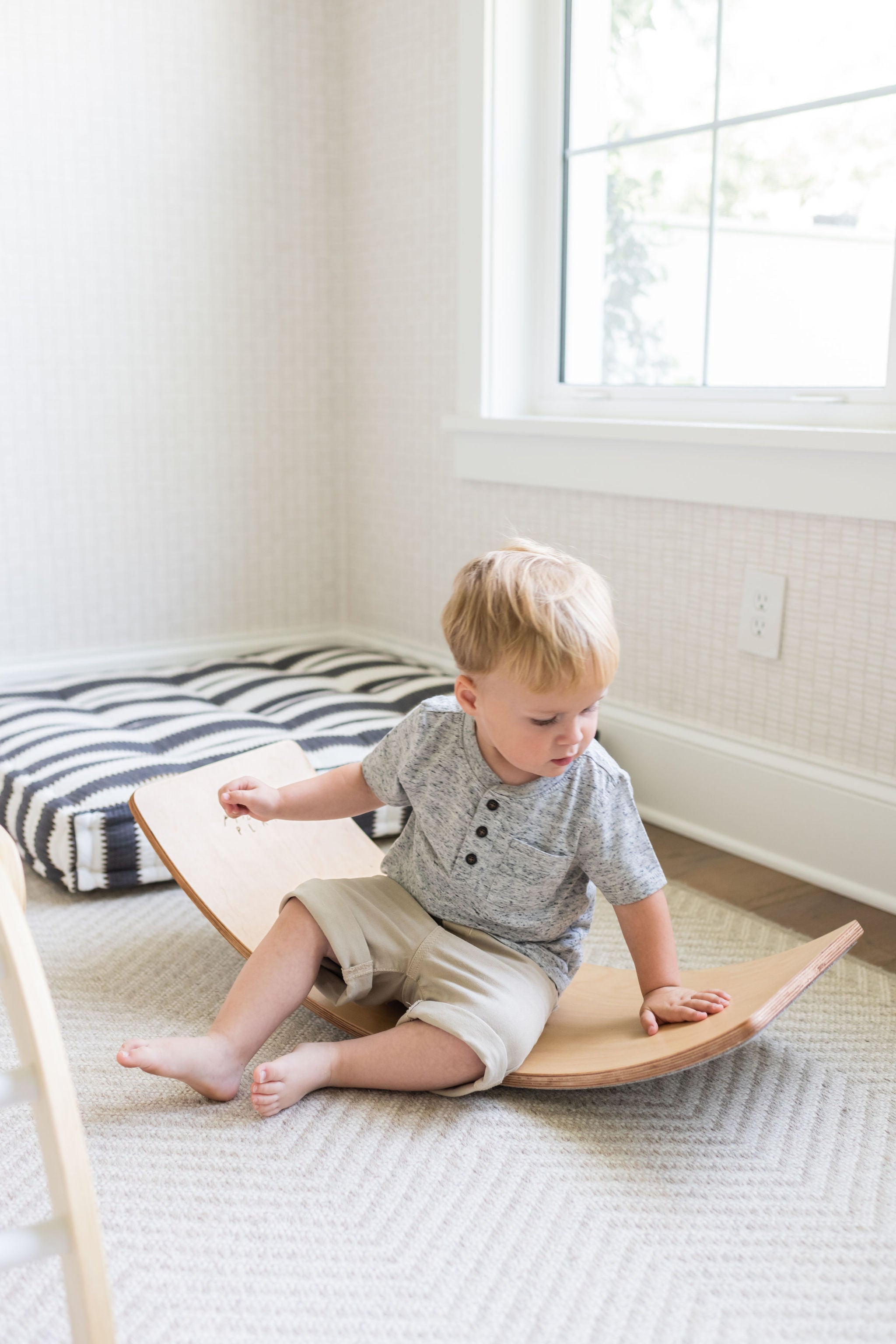 Wooden balance board enhances balance and strength.