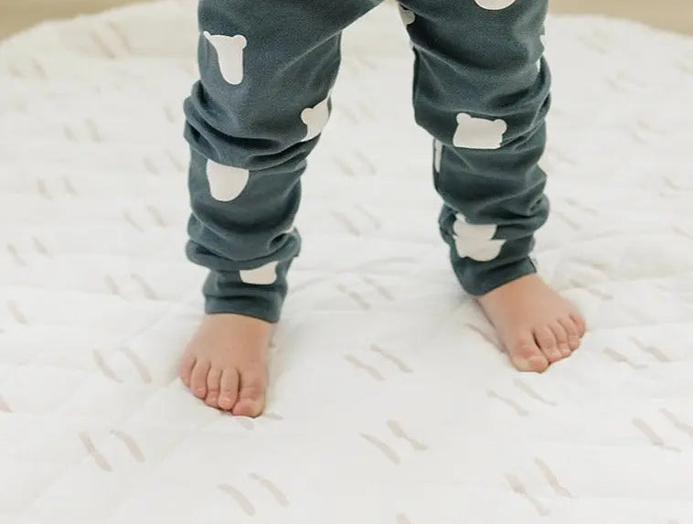 Baby Gym & Play Mat in a Bright Playroom