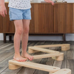 Child Walking on Balance Beam