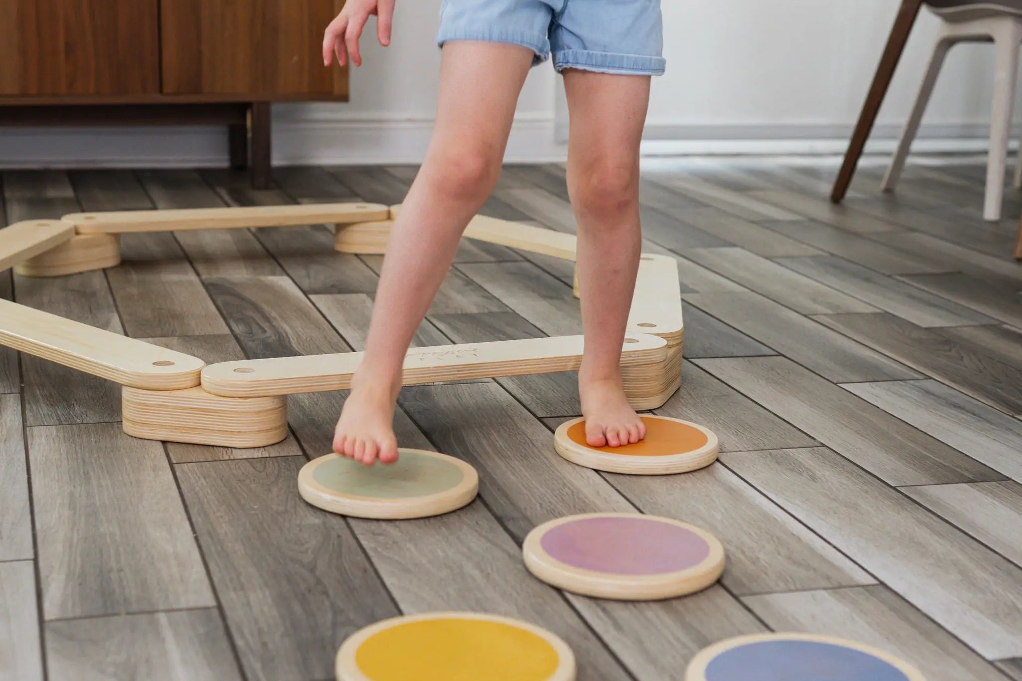 Detailed view of the balance beam, stepping stones, and balance board in the Ultimate Balance Bundle.