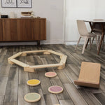 Children playing with the balance beam, stepping stones, and balance board from the Ultimate Balance Bundle.