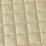 Close-up of the square quilting on the 100% cotton Neutral Round Baby Play Mat
