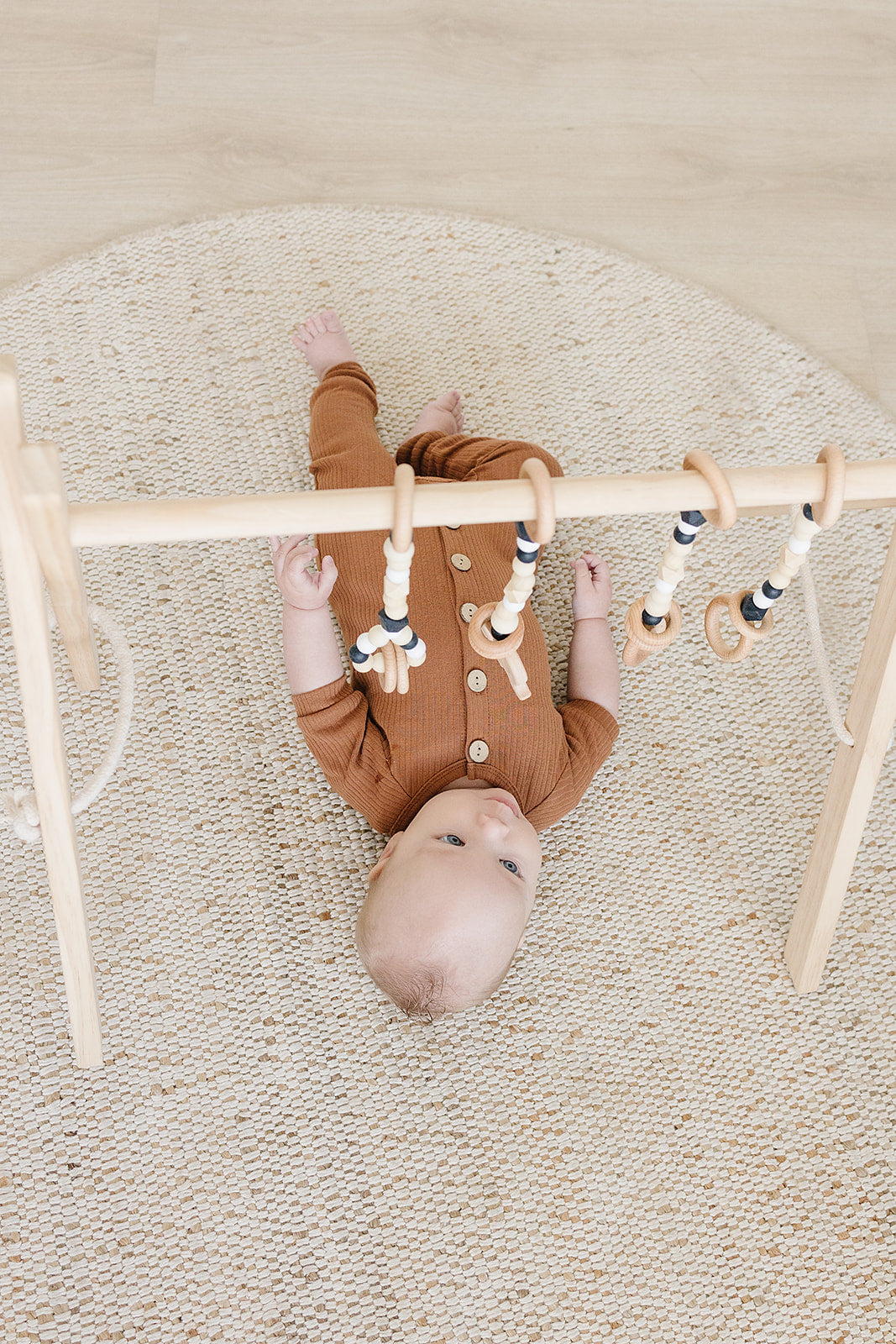 Wooden Baby Gym + Black Toys  - Poppyseed Play