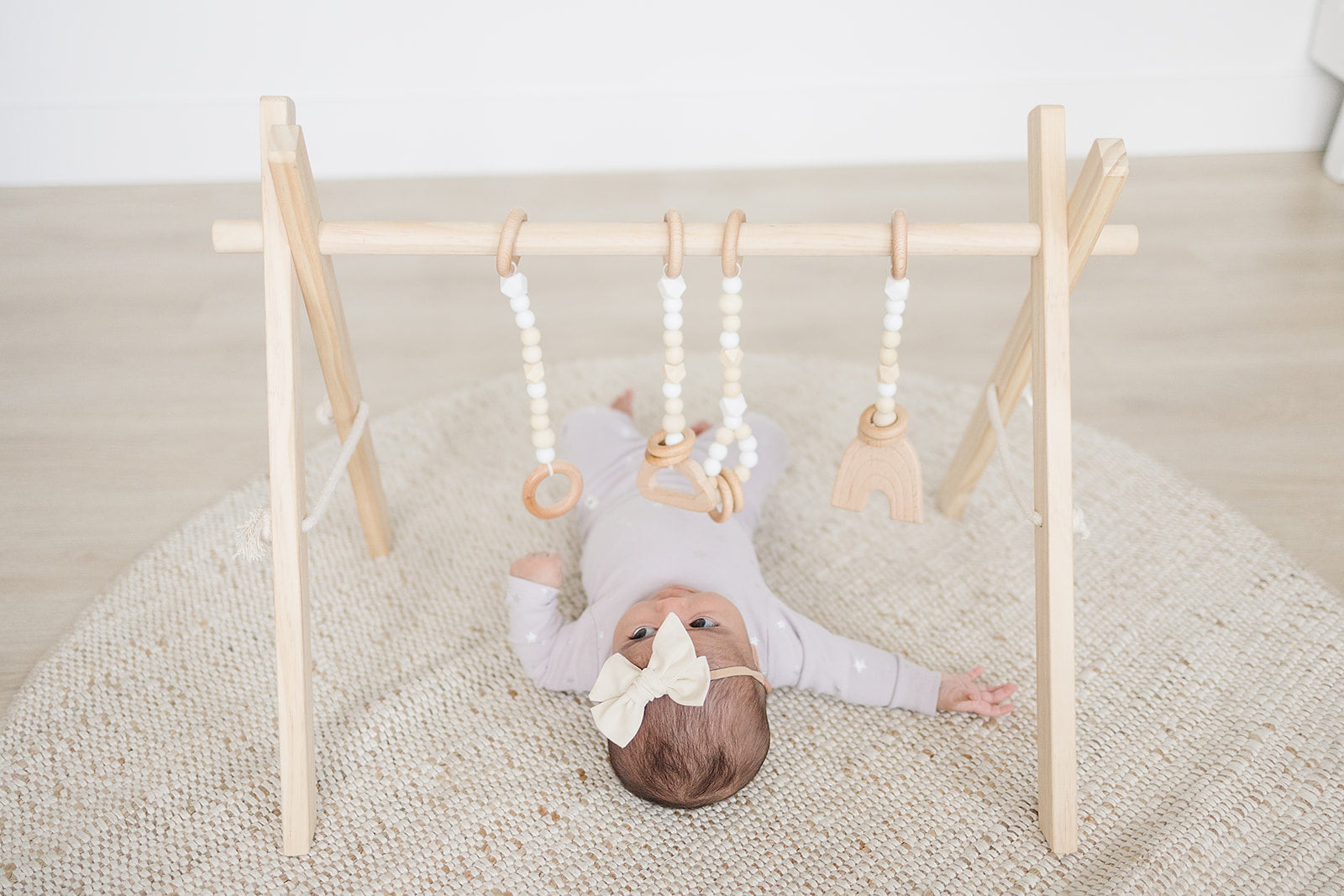 Wooden Baby Gym + White Toys  - Poppyseed Play
