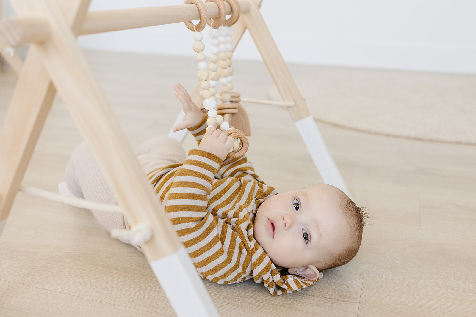 Wooden Baby Gym + White Toys  - Poppyseed Play