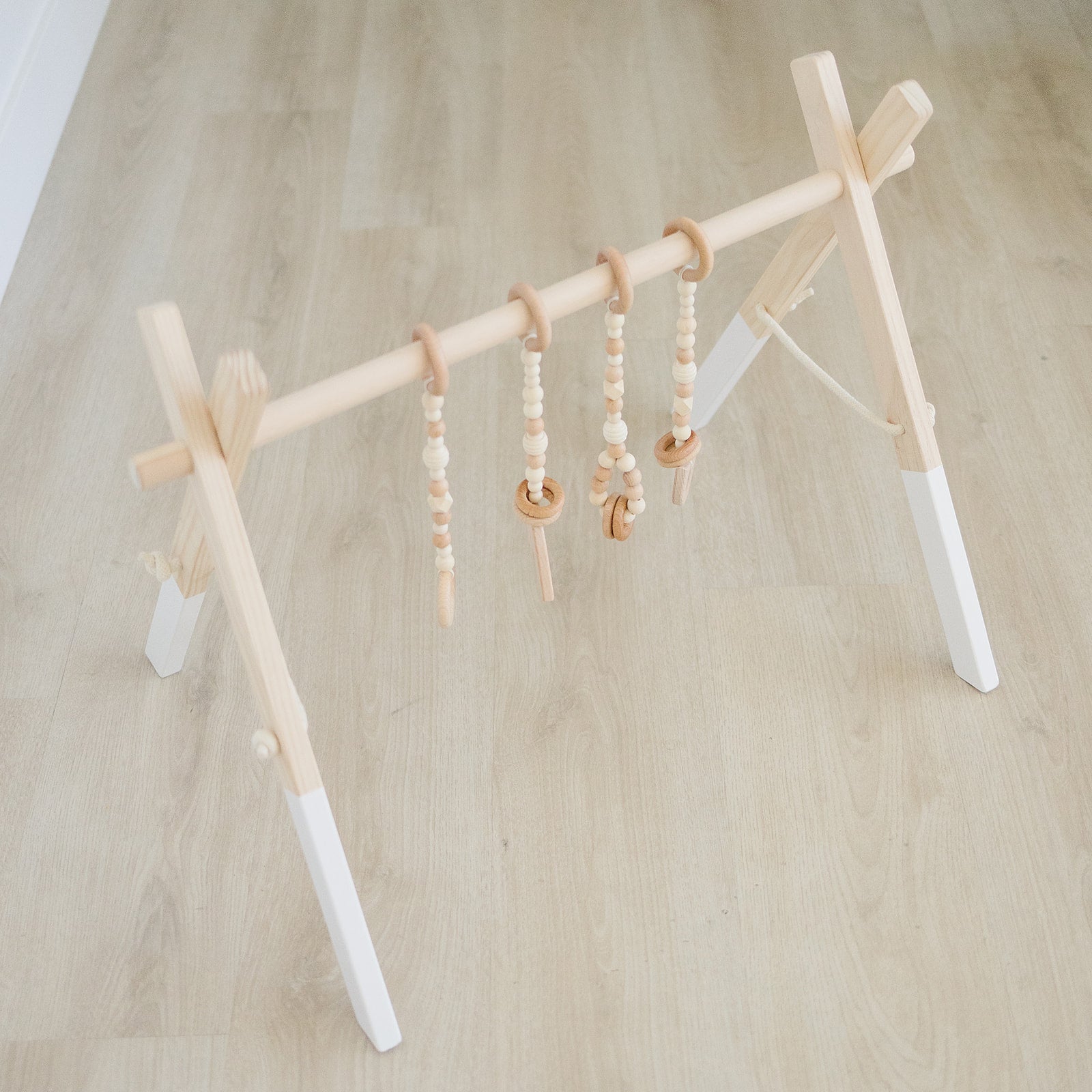 Wooden Baby Gym + Natural Wood Toys  - Poppyseed Play